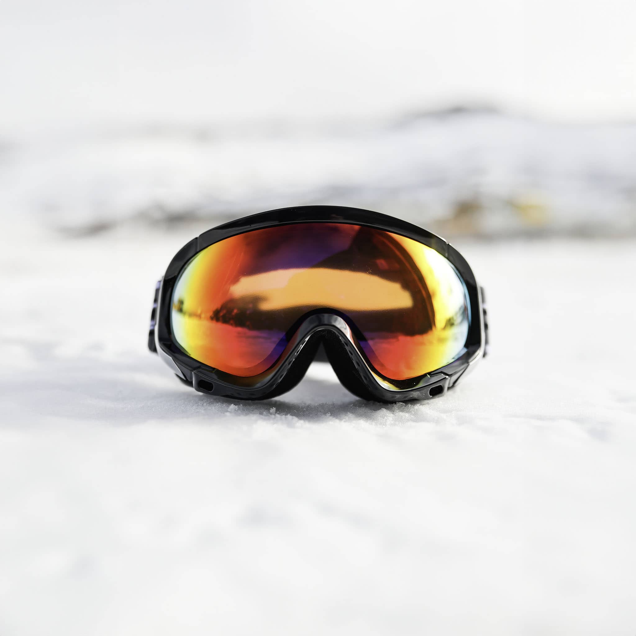 Xtreme Mirrored Adult Snow Goggles in black, front view, REVO red mirrored lens, UV400 protection