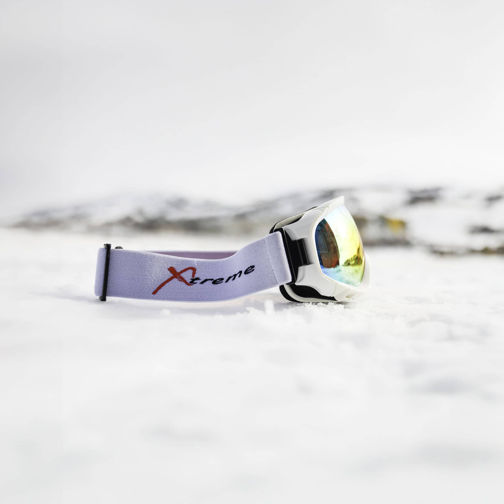 Xtreme Mirrored Adult Snow Goggles in white, side view, REVO red mirrored lens, low-bridge fit
